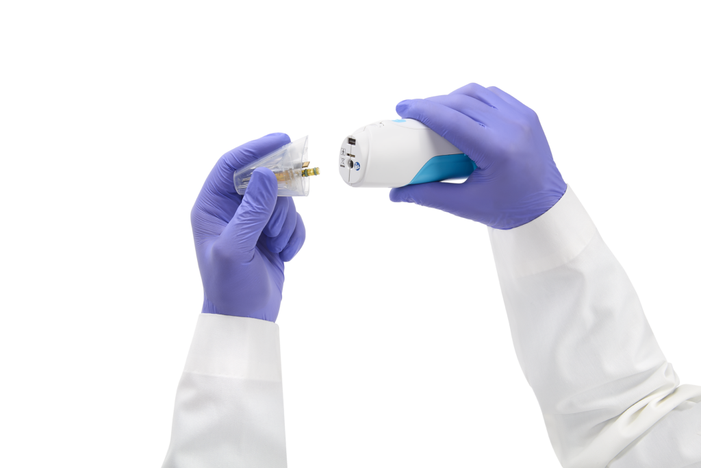 iovera device being held by doctor